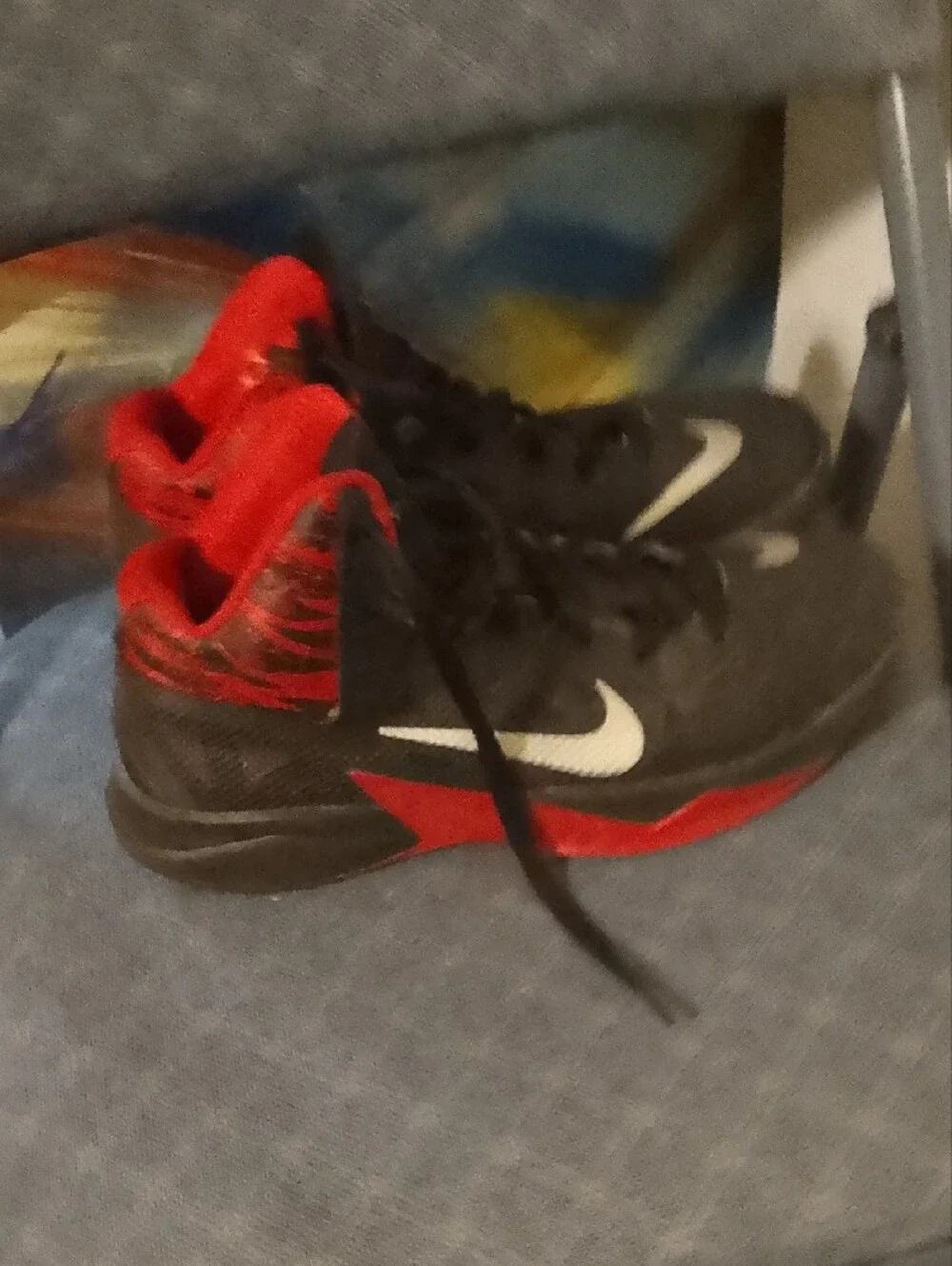 Nike Black and Red High-Top Sneakers with White Swoosh